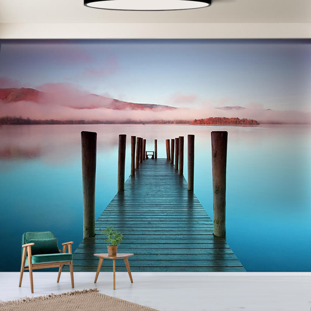 Sunrise over the sea pier and cloudy hills wall mural