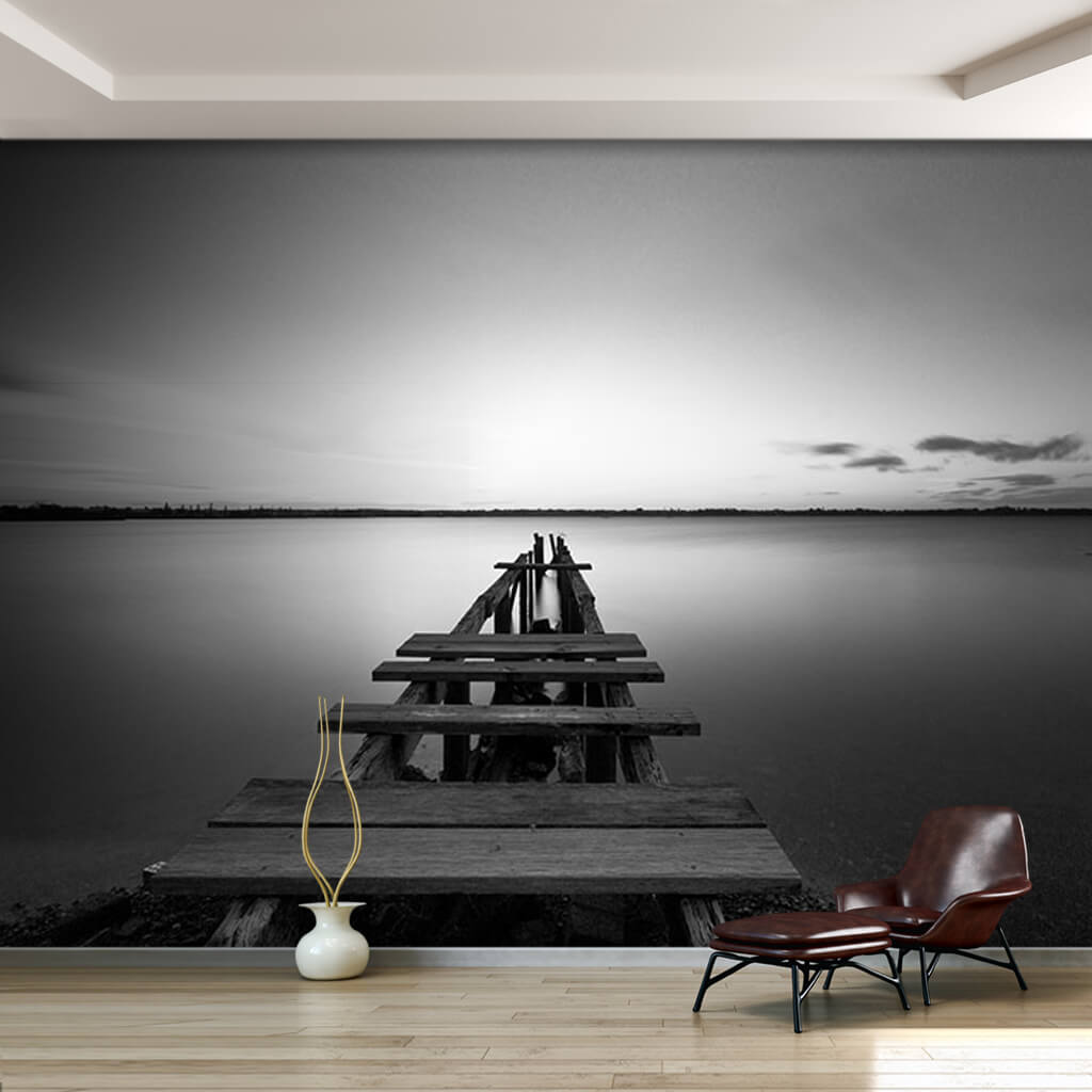 Ruin wooden pier extending to the sea black white wall mural