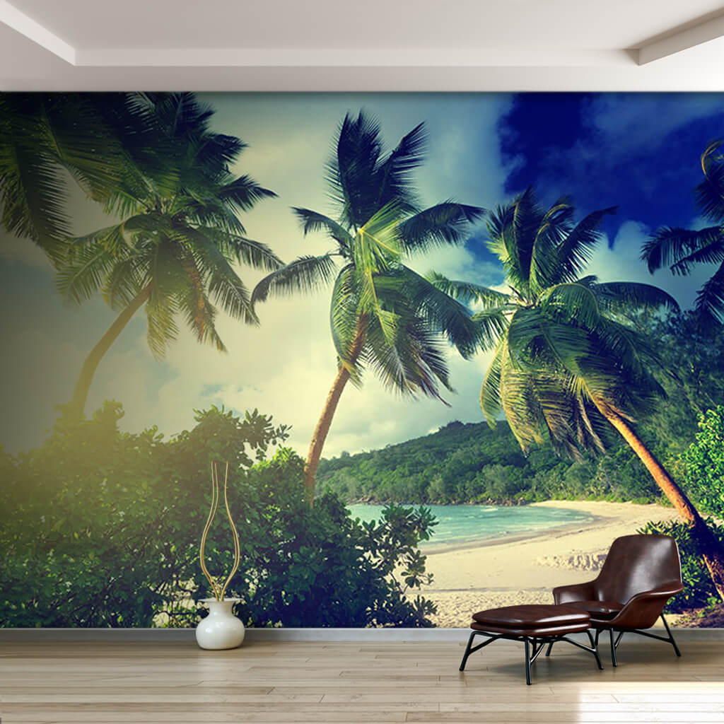 Island coast and palm trees swaying in the wind wall mural