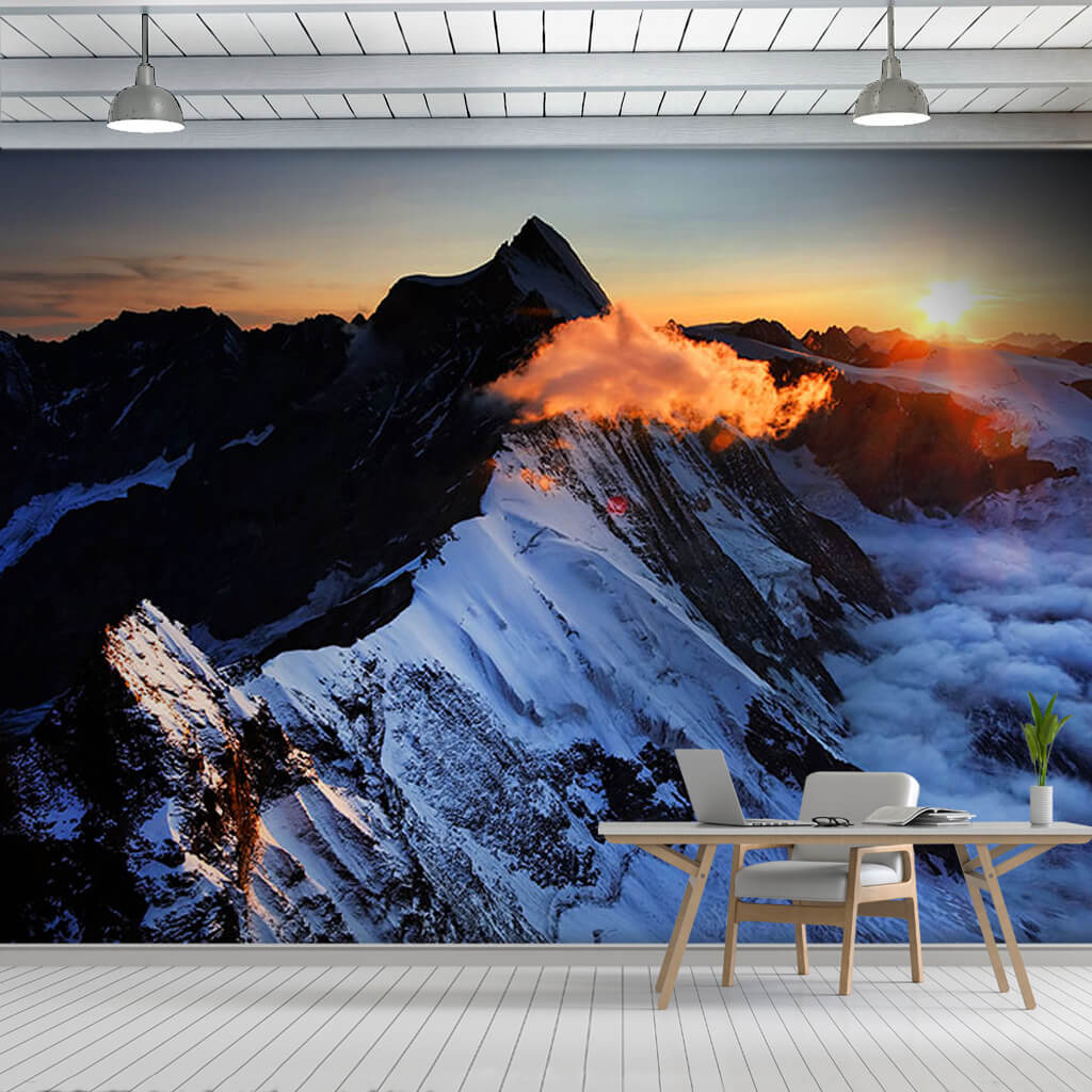 Sunset over snowy mountain ridge and summit custom wall mural