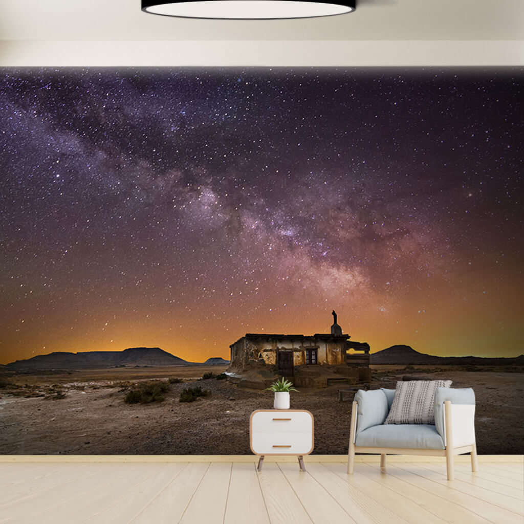 Milky Way and stars hut in the desert at night wall mural