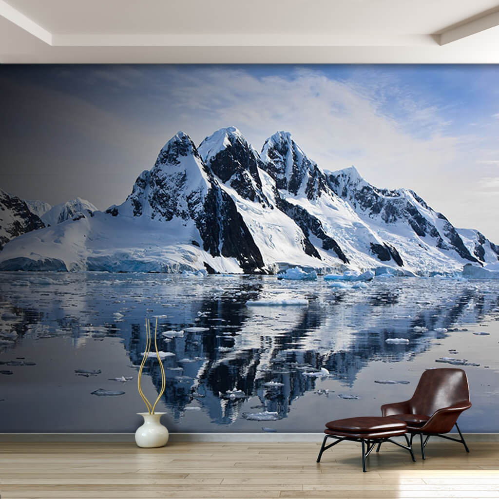 Snowy mountain reflection on icy water Antarctica wall mural