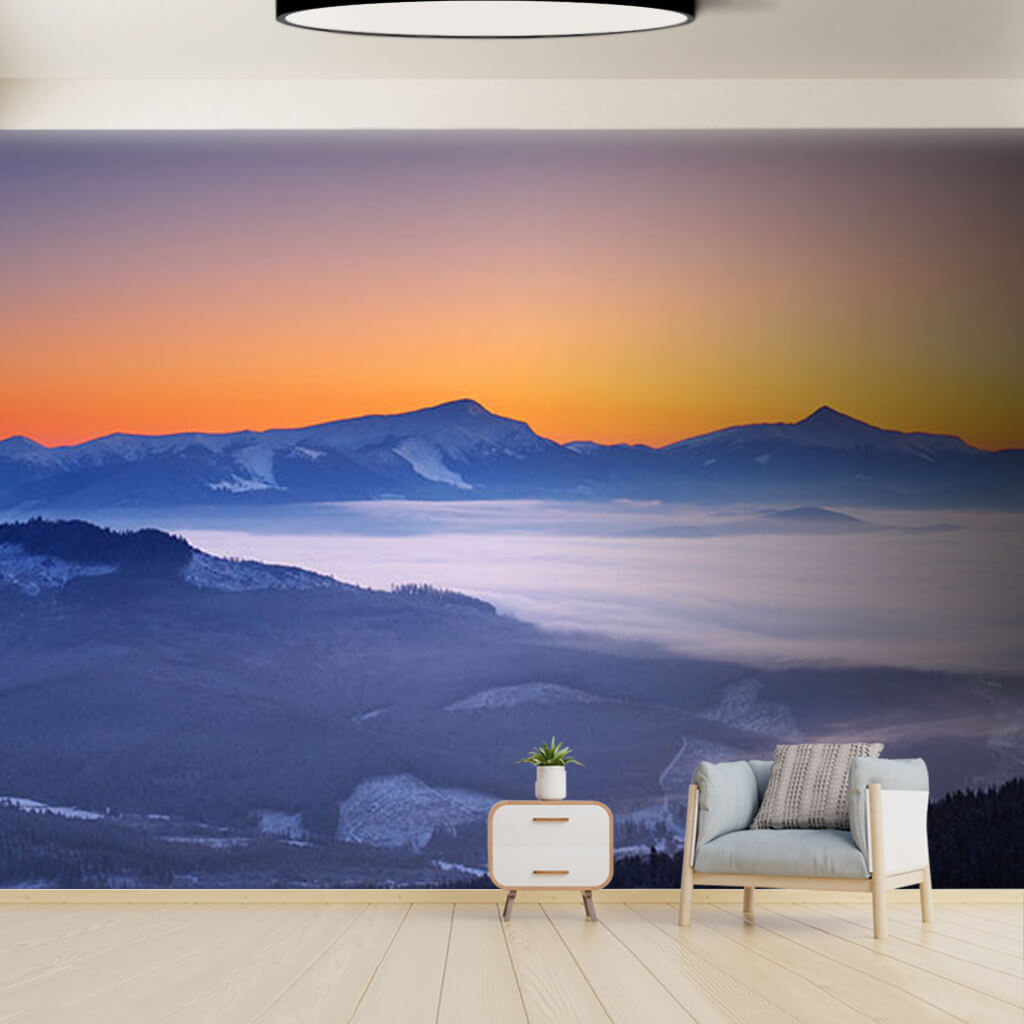 View of the clouds and mountains from summit wall mural