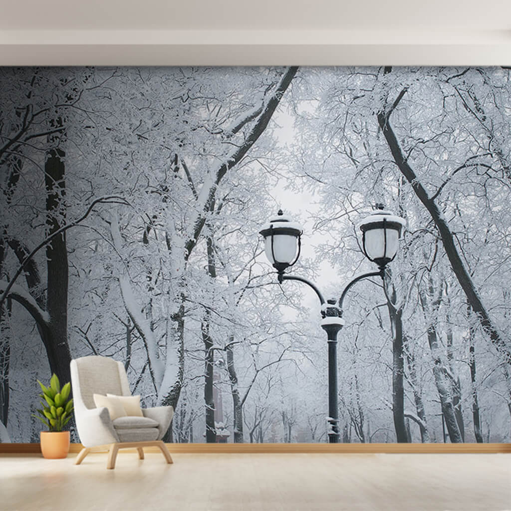Snowy trees and street lamp in winter season wall mural